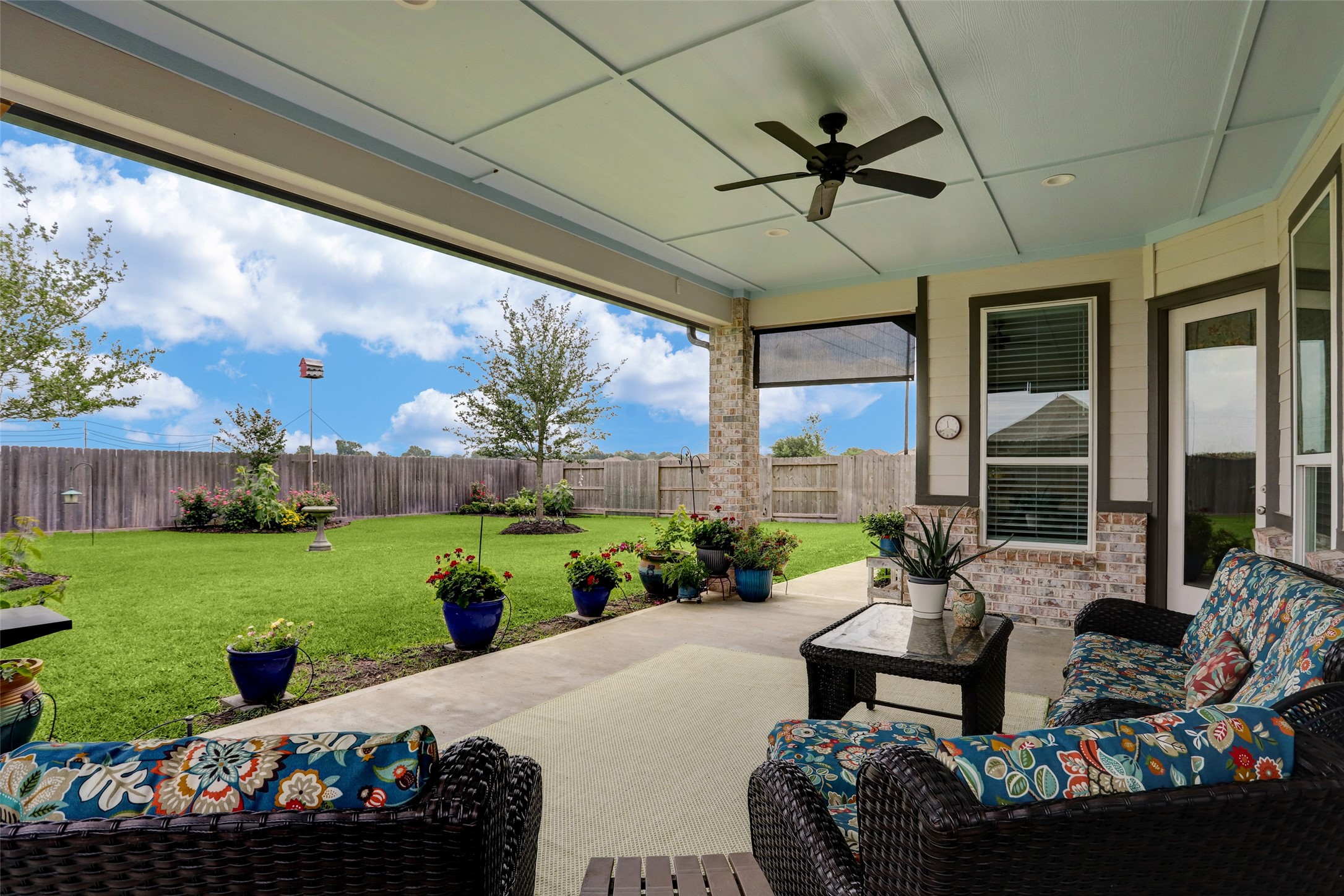 Large Covered Back Patio - If you have additional questions regarding 409 Hunters Crossing Drive  in Sealy or would like to tour the property with us call 800-660-1022 and reference MLS# 67427616.