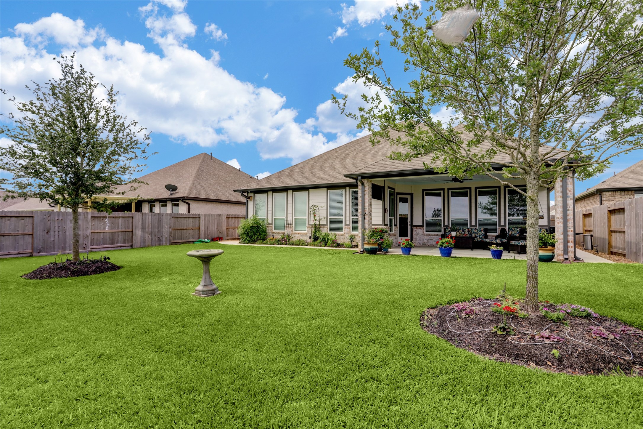 Beautiful Backyard - If you have additional questions regarding 409 Hunters Crossing Drive  in Sealy or would like to tour the property with us call 800-660-1022 and reference MLS# 67427616.