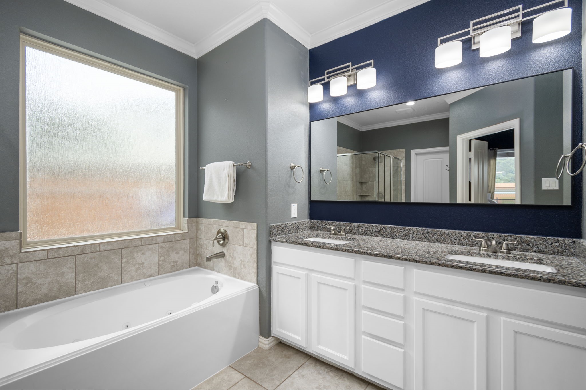 Primary Bathroom - If you have additional questions regarding 7423 Simpson Springs Lane  in Spring or would like to tour the property with us call 800-660-1022 and reference MLS# 15164487.