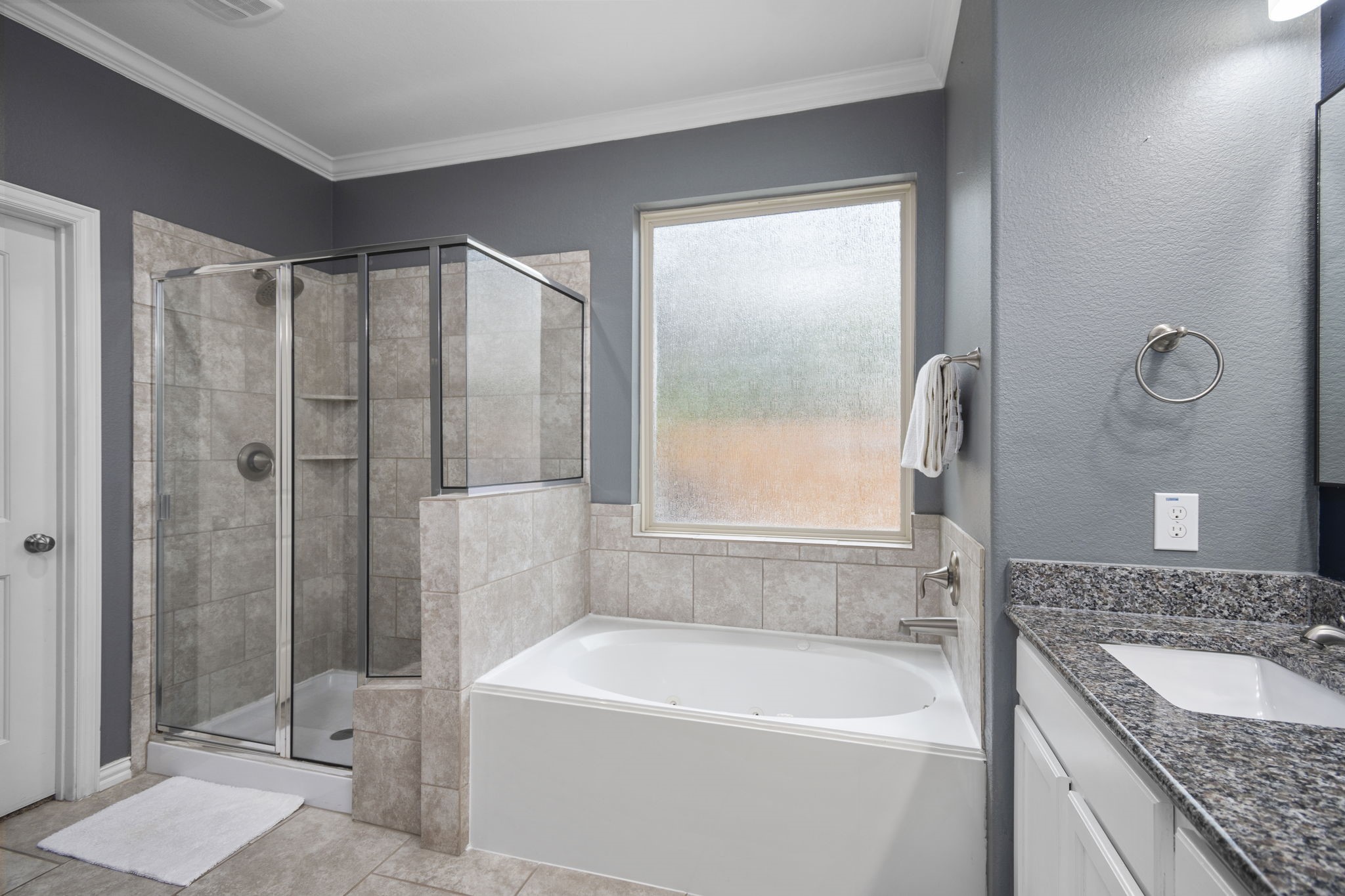 Primary Bathroom - If you have additional questions regarding 7423 Simpson Springs Lane  in Spring or would like to tour the property with us call 800-660-1022 and reference MLS# 15164487.