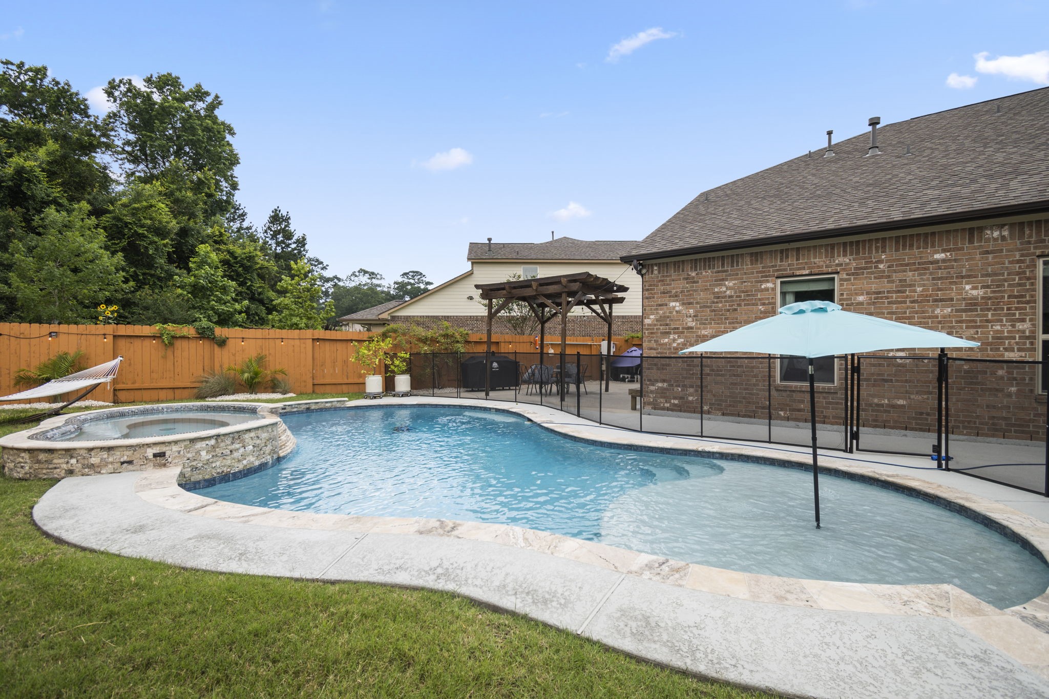 Backyard Saltwater Pool - If you have additional questions regarding 7423 Simpson Springs Lane  in Spring or would like to tour the property with us call 800-660-1022 and reference MLS# 15164487.