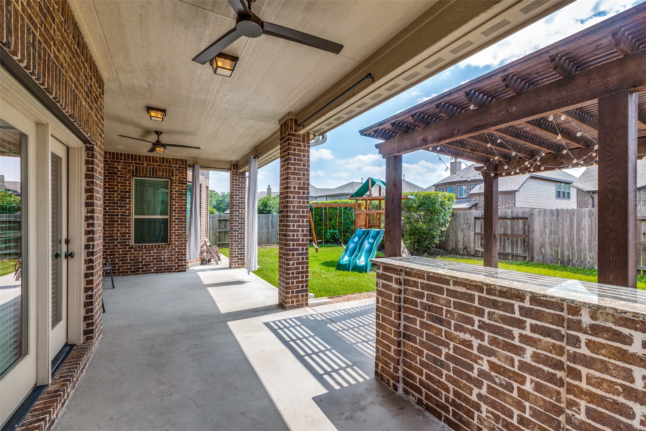 The custom bar is a great set-up for your next outdoor party. - If you have additional questions regarding 27958 Arden Trail Drive  in Spring or would like to tour the property with us call 800-660-1022 and reference MLS# 8317570.