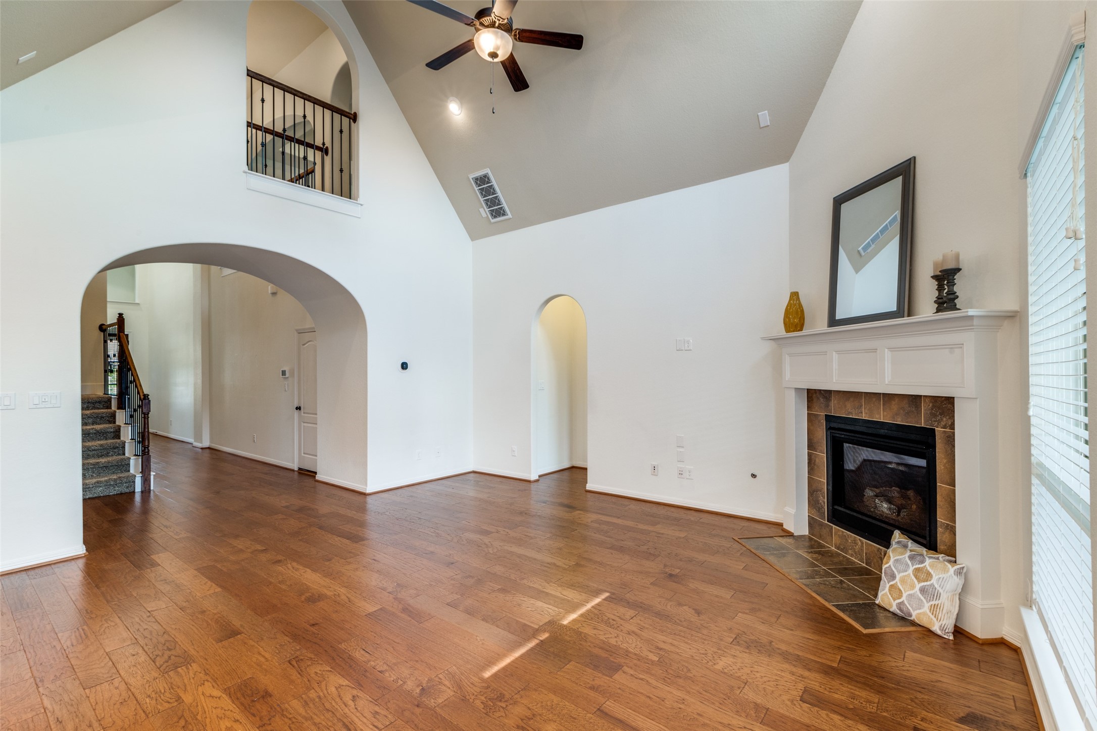 Arched openings into the great room. - If you have additional questions regarding 27958 Arden Trail Drive  in Spring or would like to tour the property with us call 800-660-1022 and reference MLS# 8317570.