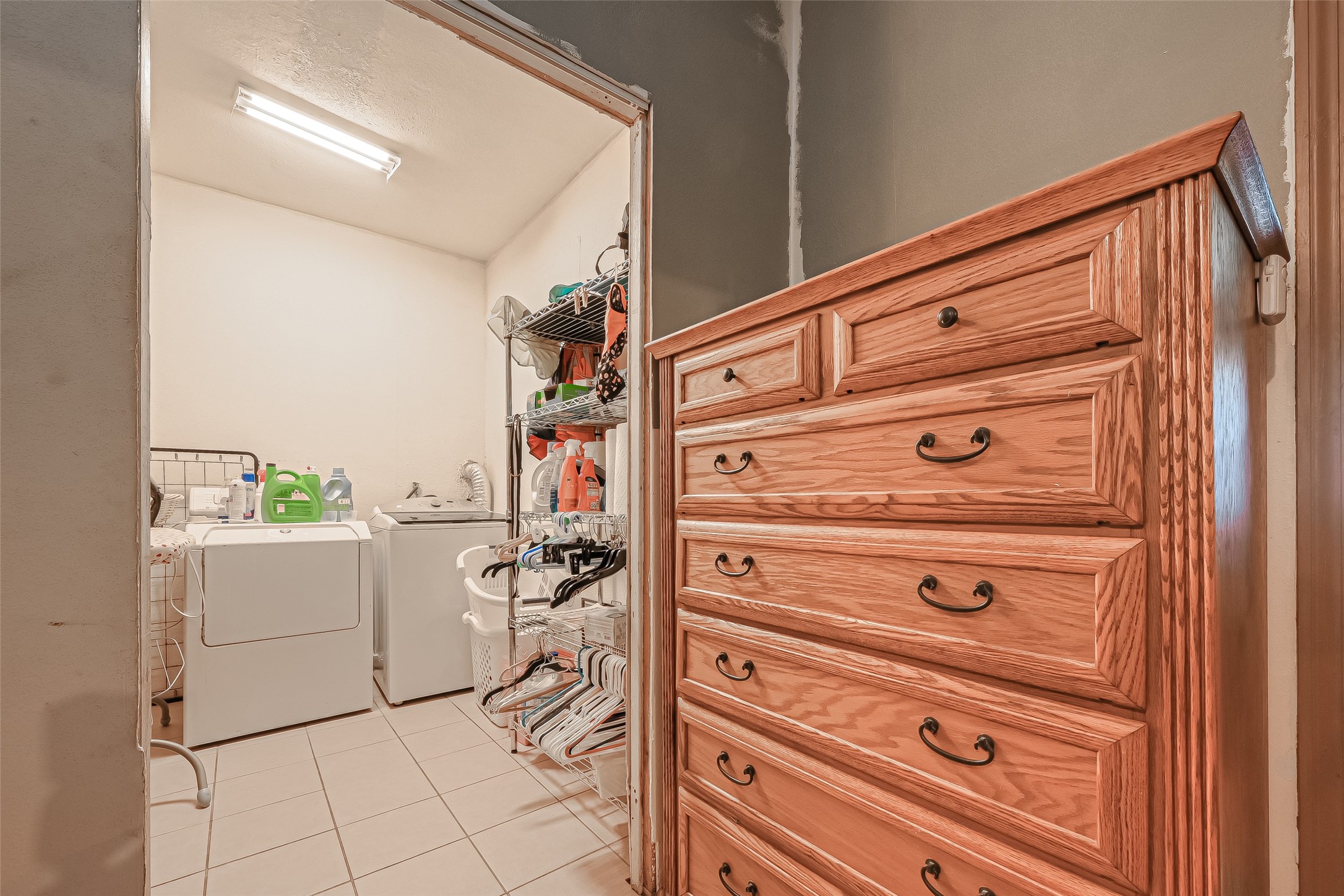 Large laundry room - If you have additional questions regarding 122 W Sterling Street  in Baytown or would like to tour the property with us call 800-660-1022 and reference MLS# 98485441.
