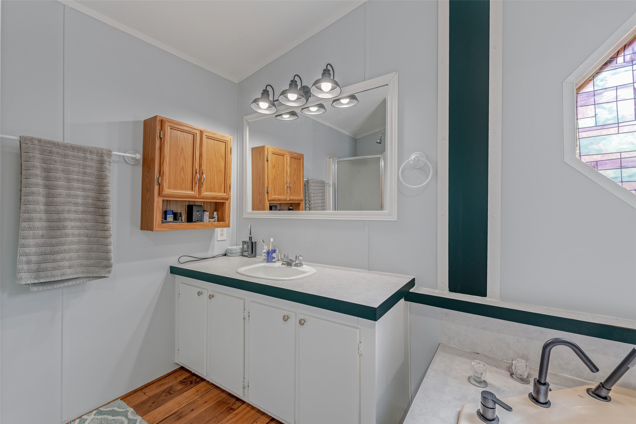 MASTER BATHROOM - If you have additional questions regarding 2055 Green Meadows Drive  in Sealy or would like to tour the property with us call 800-660-1022 and reference MLS# 16848431.