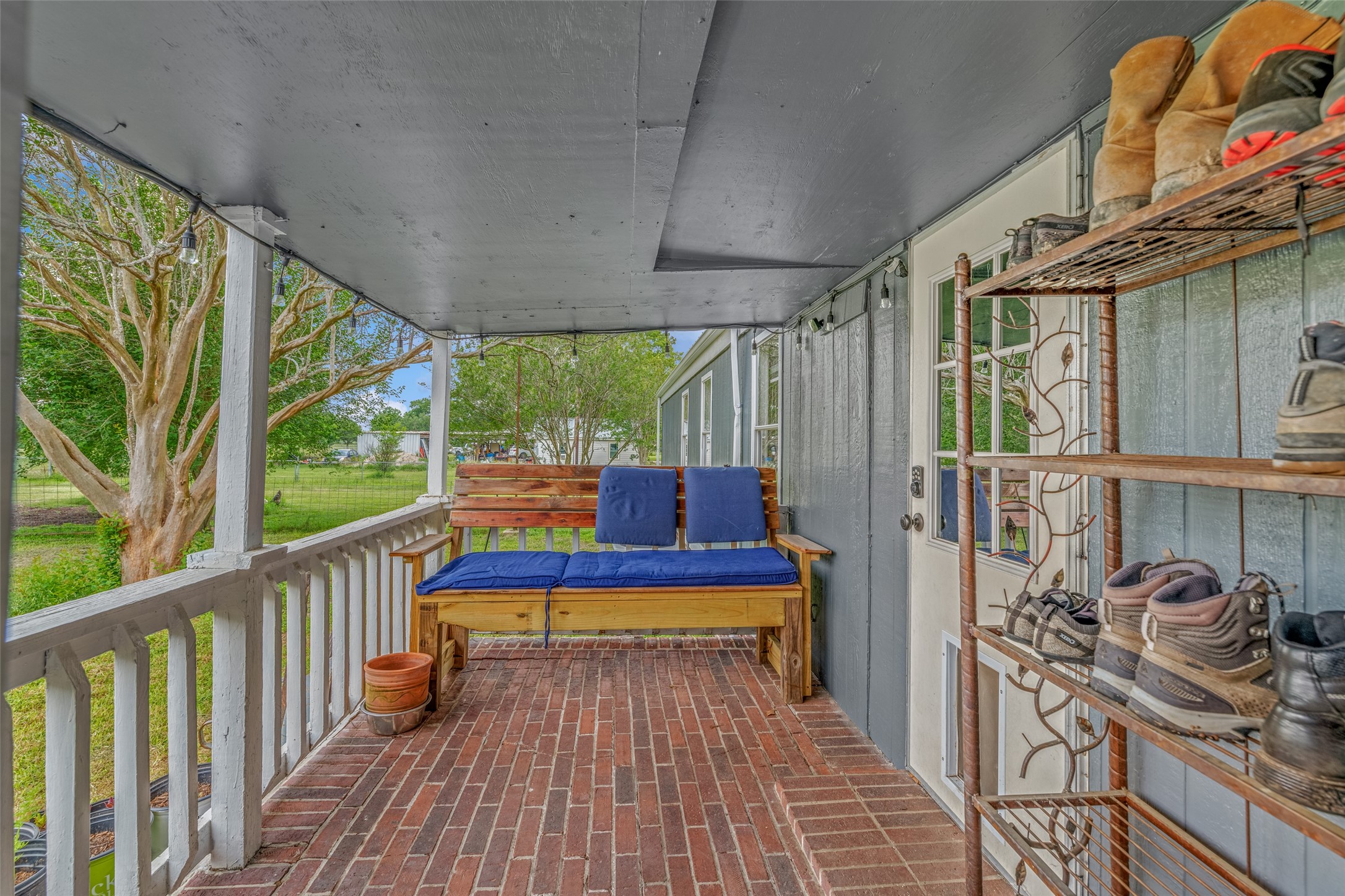 BACK PORCH - If you have additional questions regarding 2055 Green Meadows Drive  in Sealy or would like to tour the property with us call 800-660-1022 and reference MLS# 16848431.