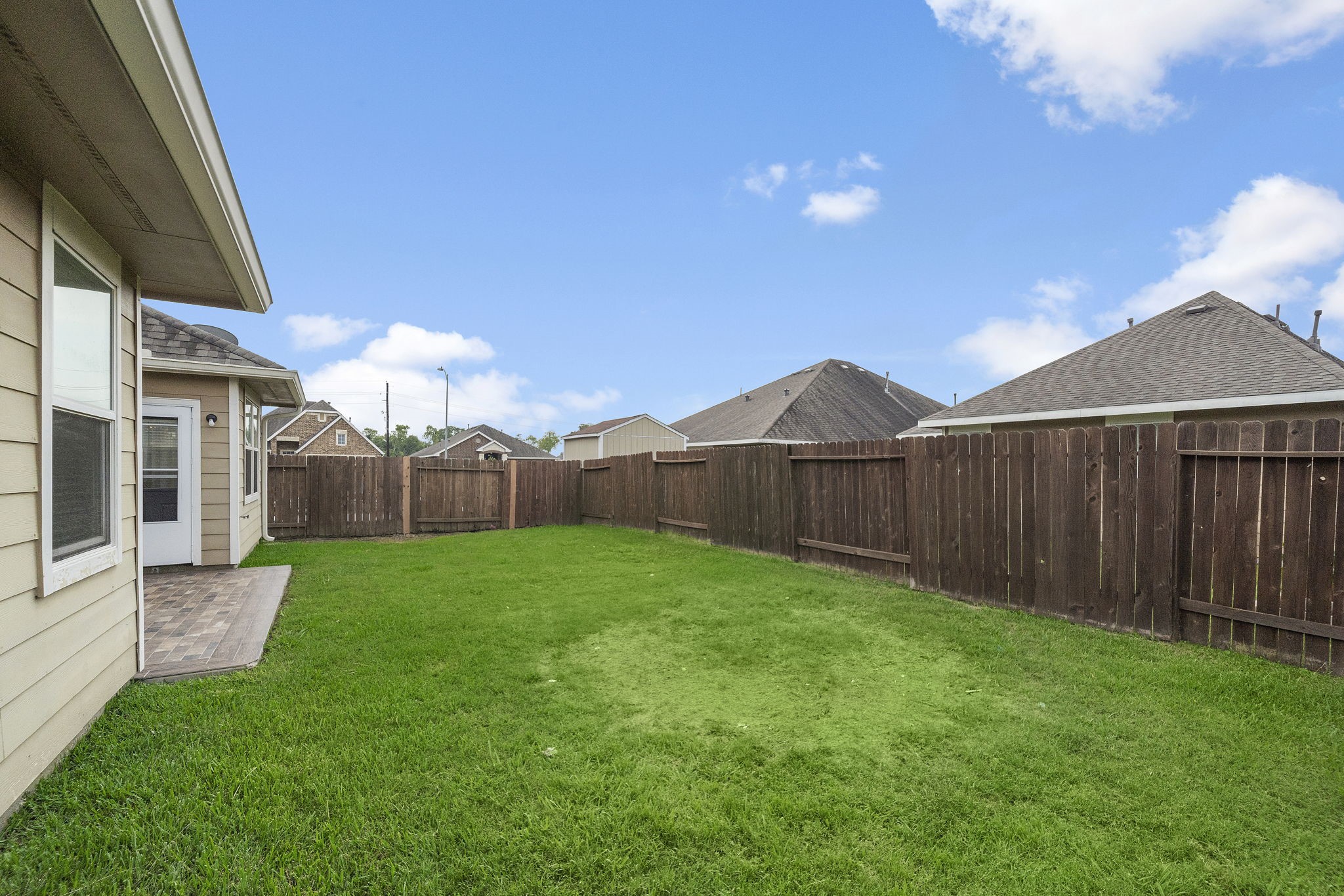 The fenced backyard of this home offers a secure and private outdoor oasis, perfect for enjoying outdoor activities and creating cherished memories with family and friends. - If you have additional questions regarding 8307 Egret Bay Circle  in Baytown or would like to tour the property with us call 800-660-1022 and reference MLS# 61311135.