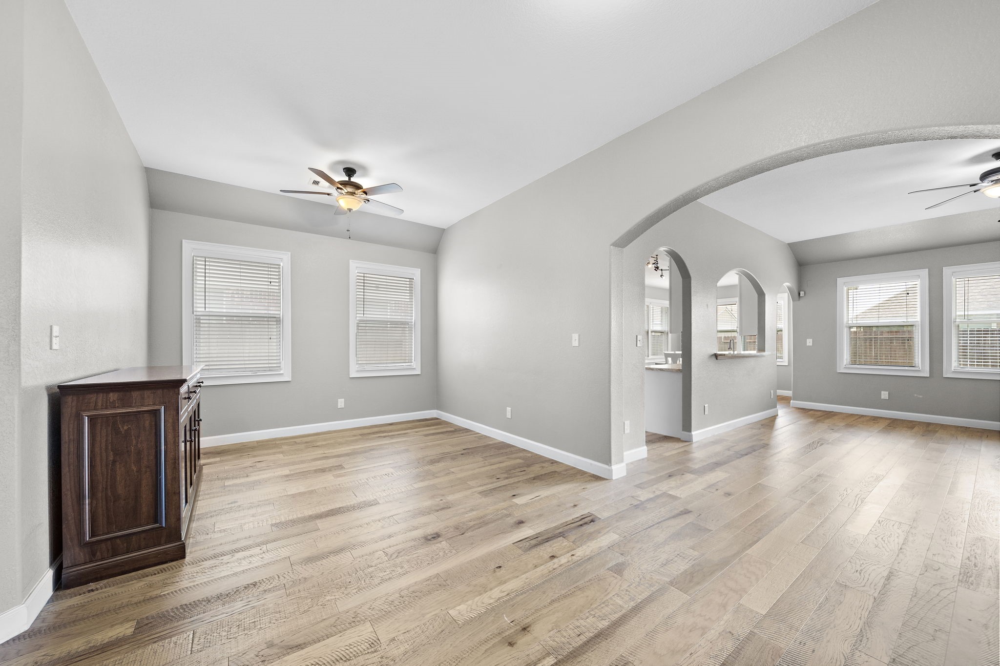 Experience the warmth and beauty of this home adorned with stunning wood flooring throughout, adding a touch of elegance to every room. - If you have additional questions regarding 8307 Egret Bay Circle  in Baytown or would like to tour the property with us call 800-660-1022 and reference MLS# 61311135.