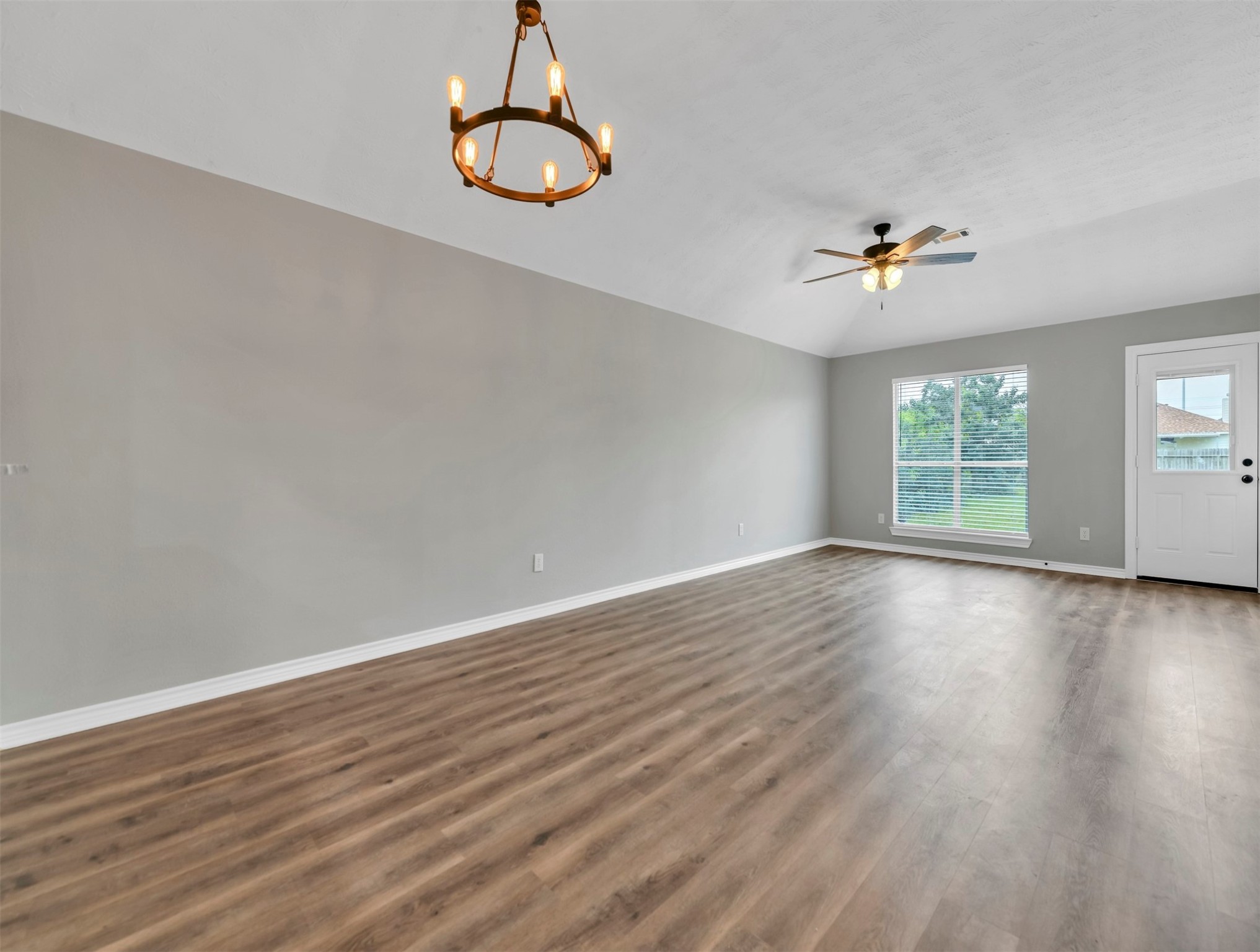 dinning space and living room - If you have additional questions regarding 14915 Sparks Court  in Baytown or would like to tour the property with us call 800-660-1022 and reference MLS# 16989734.