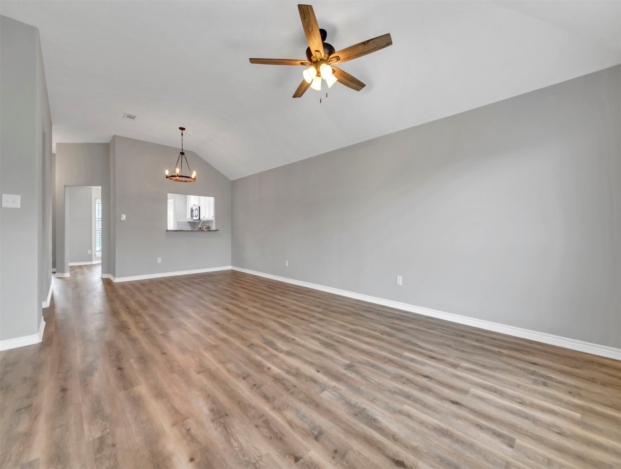 looking back at kitchen and entry from living room - If you have additional questions regarding 14915 Sparks Court  in Baytown or would like to tour the property with us call 800-660-1022 and reference MLS# 16989734.