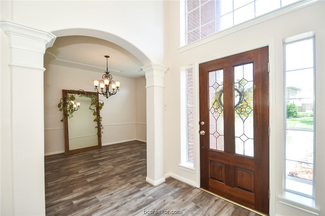ENTRANCE TO FORMAL DINING ROOM - If you have additional questions regarding 4420 IRONWOOD DR  in Baytown or would like to tour the property with us call 800-660-1022 and reference MLS# 23007425.