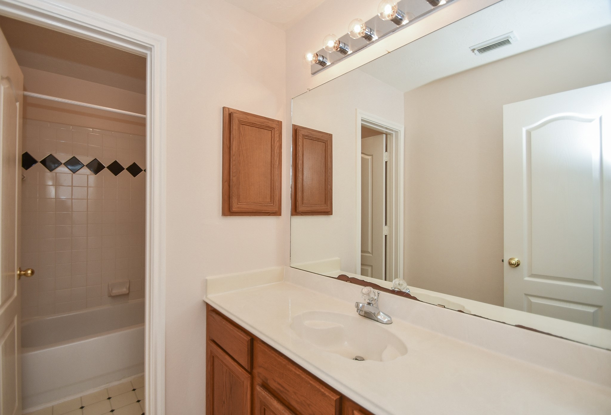Upstairs Full Bathroom - If you have additional questions regarding 4420 IRONWOOD DRIVE  in Baytown or would like to tour the property with us call 800-660-1022 and reference MLS# 13145098.