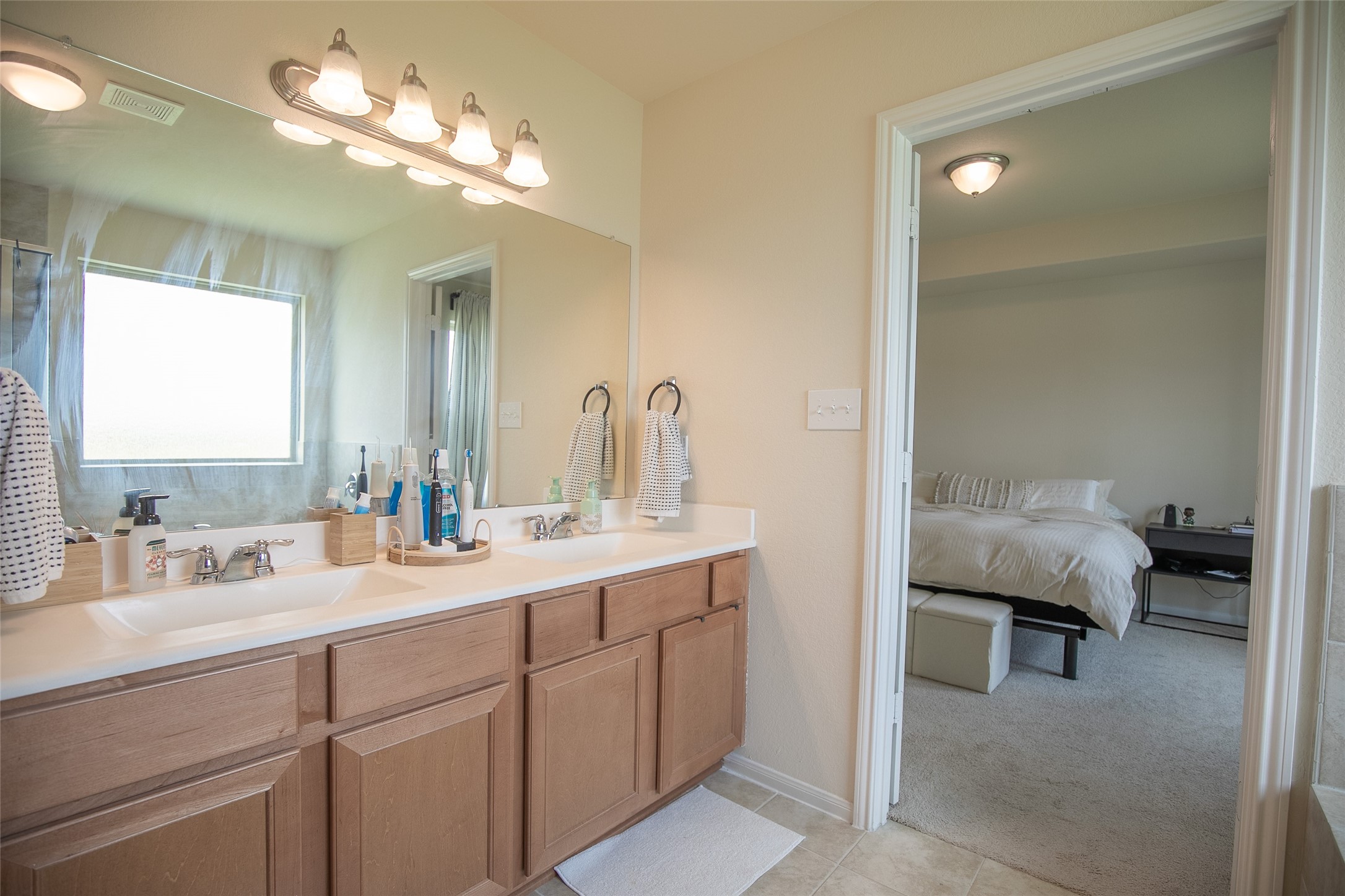 Another view of the Primary bedroom  and bathroom - If you have additional questions regarding 2835 Meandering Elm Trail  in Houston or would like to tour the property with us call 800-660-1022 and reference MLS# 93640209.