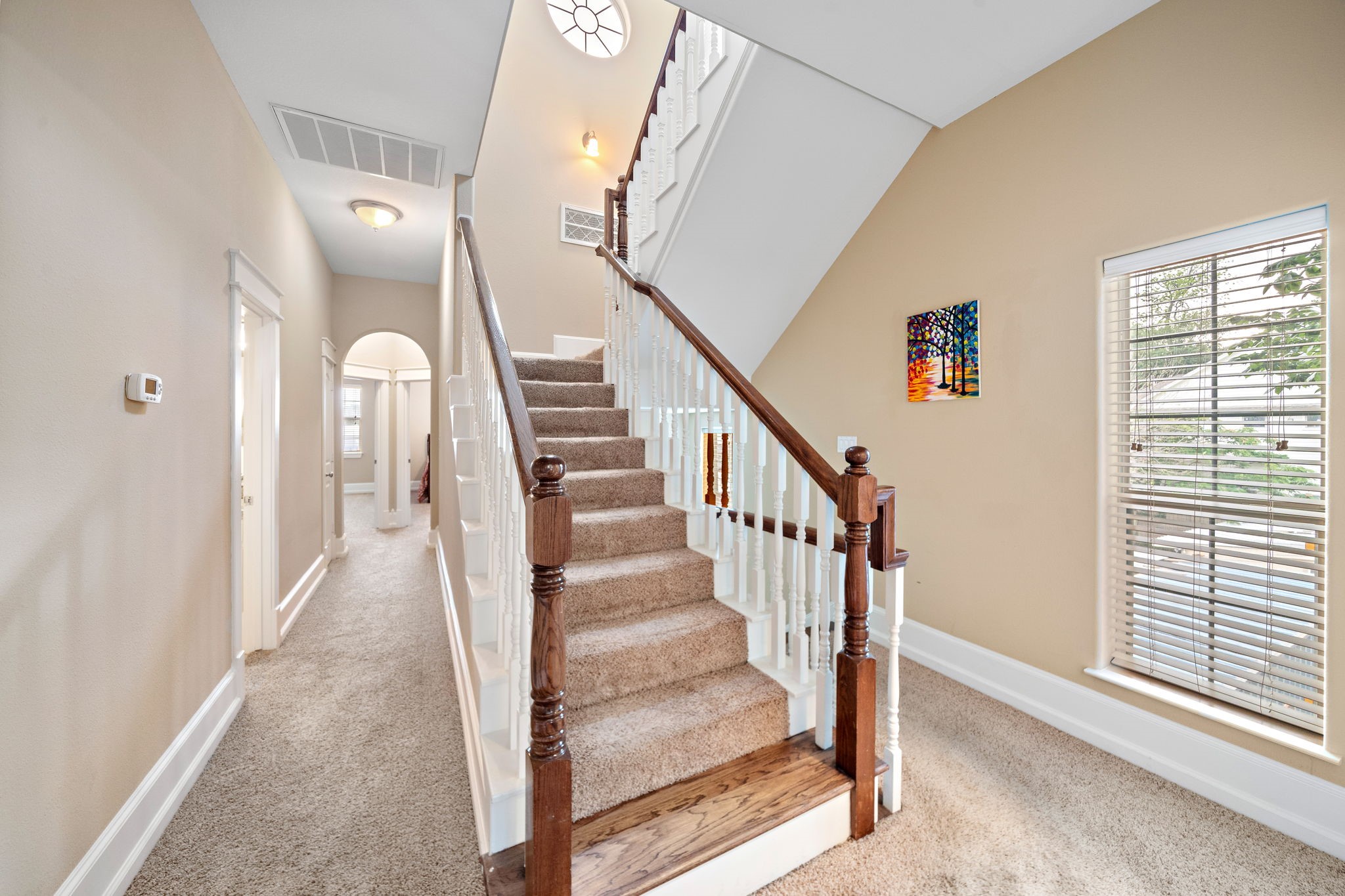 2nd story hallway and stairwell - If you have additional questions regarding 820 W 17th Street  in Houston or would like to tour the property with us call 800-660-1022 and reference MLS# 53752053.