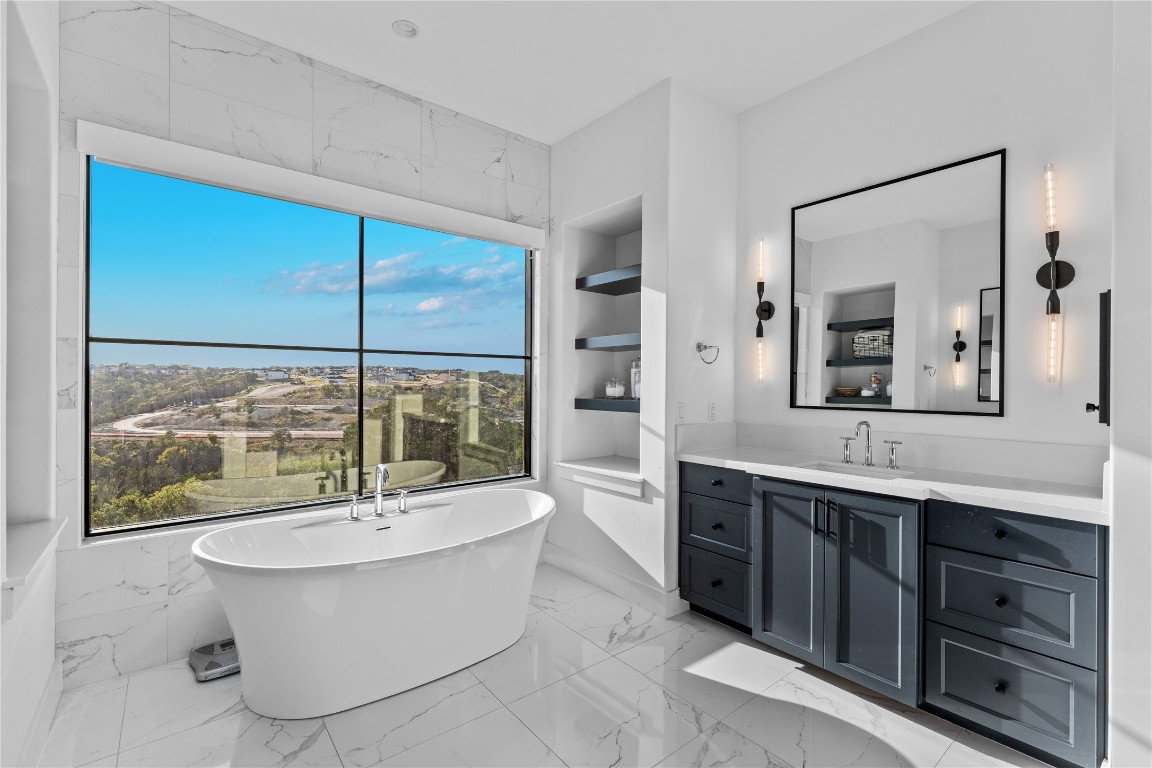 Primary walk in closet - If you have additional questions regarding 488 Primo Fiore Terrace  in Austin or would like to tour the property with us call 800-660-1022 and reference MLS# 6483601.