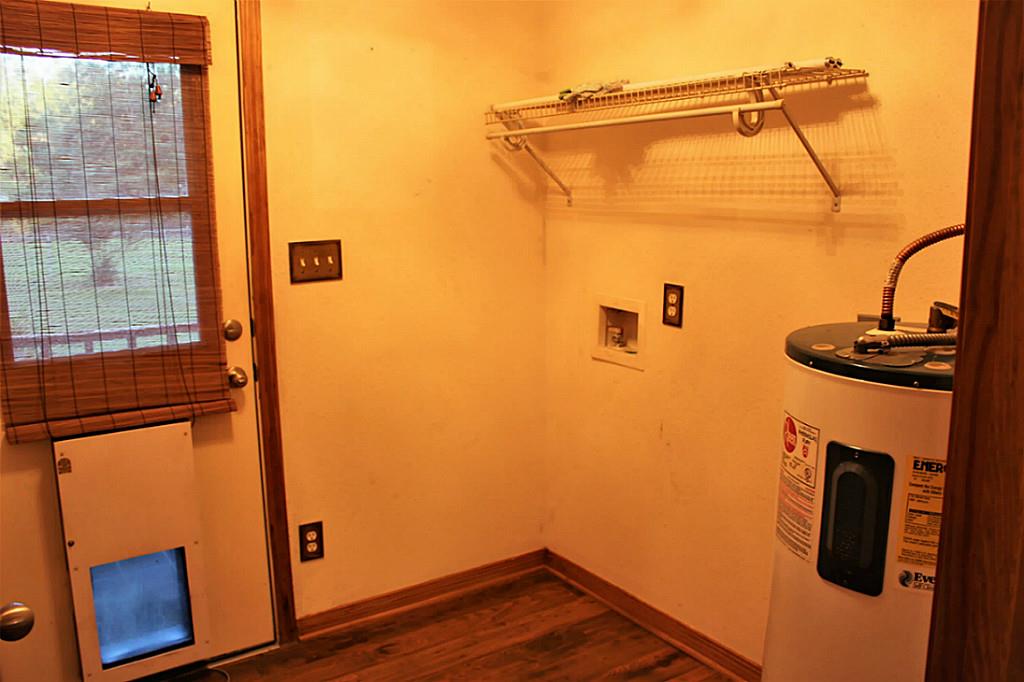 Laundry room has electric doggie door and powder room is just off this room. - If you have additional questions regarding 17021 Lexington Drive  in Conroe or would like to tour the property with us call 800-660-1022 and reference MLS# 6573860.