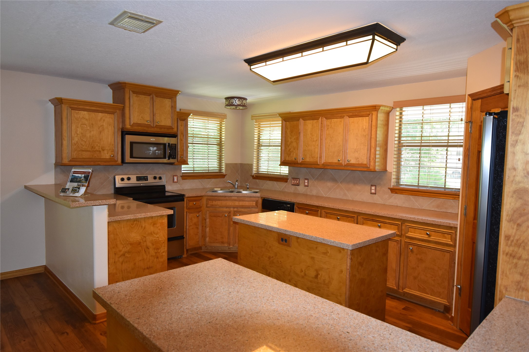 This great kitchen has loads of counter tops with great granite! - If you have additional questions regarding 17021 Lexington Drive  in Conroe or would like to tour the property with us call 800-660-1022 and reference MLS# 6573860.