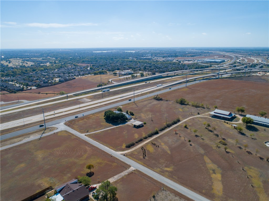 3.87 Acres near the interchange of SH 130 and SH 45 Toll Roads - Currently has a home, but highest and best use is commercial development - If you have additional questions regarding 19806 Panther Drive  in Pflugerville or would like to tour the property with us call 800-660-1022 and reference MLS# 6240465.