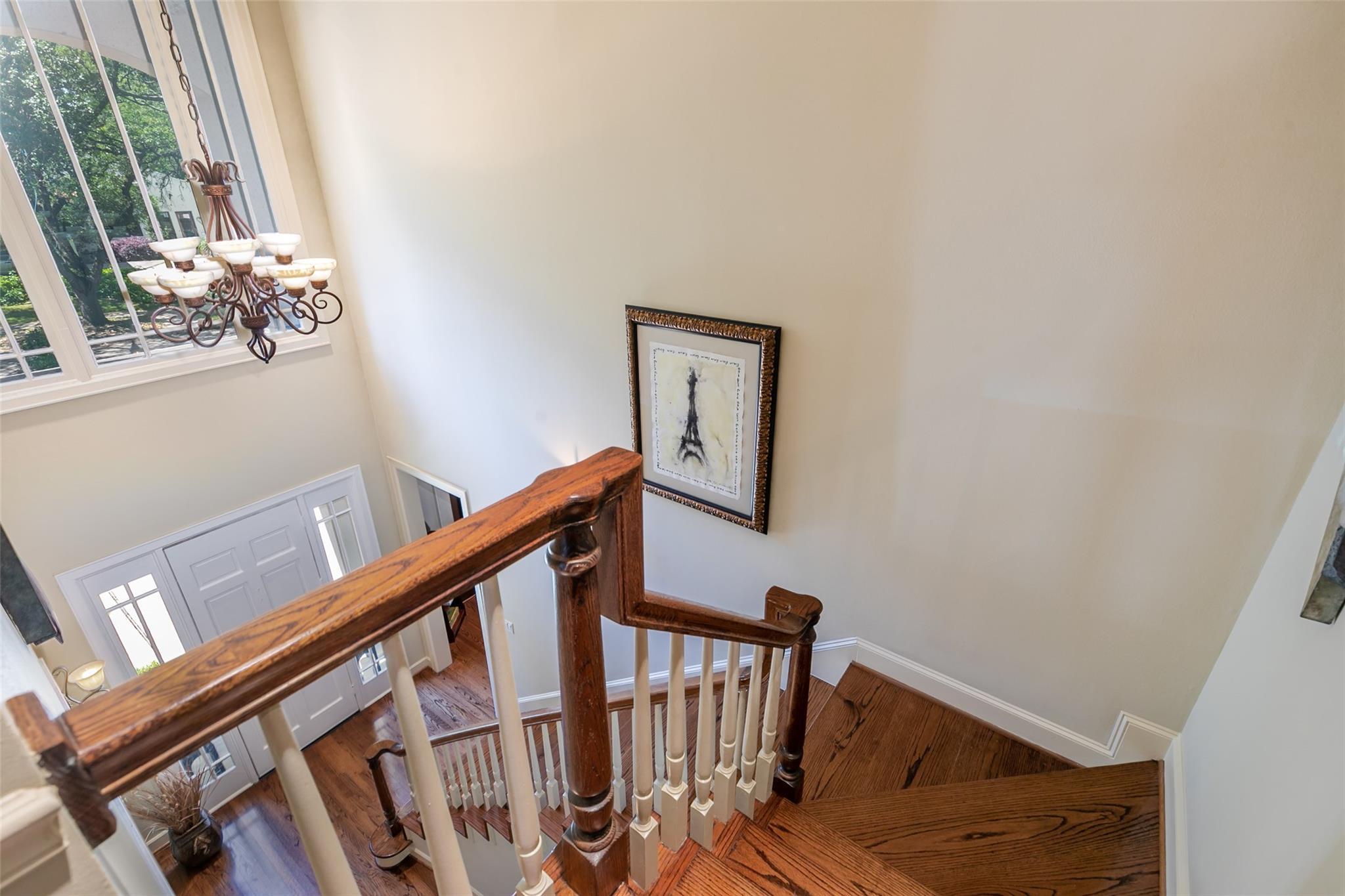 View from the second story, down the hardwood stairs. - If you have additional questions regarding 3814 Purdue Street  in Houston or would like to tour the property with us call 800-660-1022 and reference MLS# 32310789.