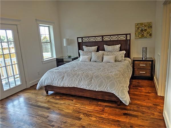 Spacious Master bedroom with doors to their private balcony. - If you have additional questions regarding 4614 Kermit  in Houston or would like to tour the property with us call 800-660-1022 and reference MLS# 37192102.