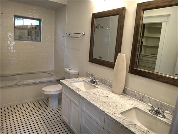 Master bath is spacious with modern classic flair & custom master closet. - If you have additional questions regarding 4614 Kermit  in Houston or would like to tour the property with us call 800-660-1022 and reference MLS# 37192102.