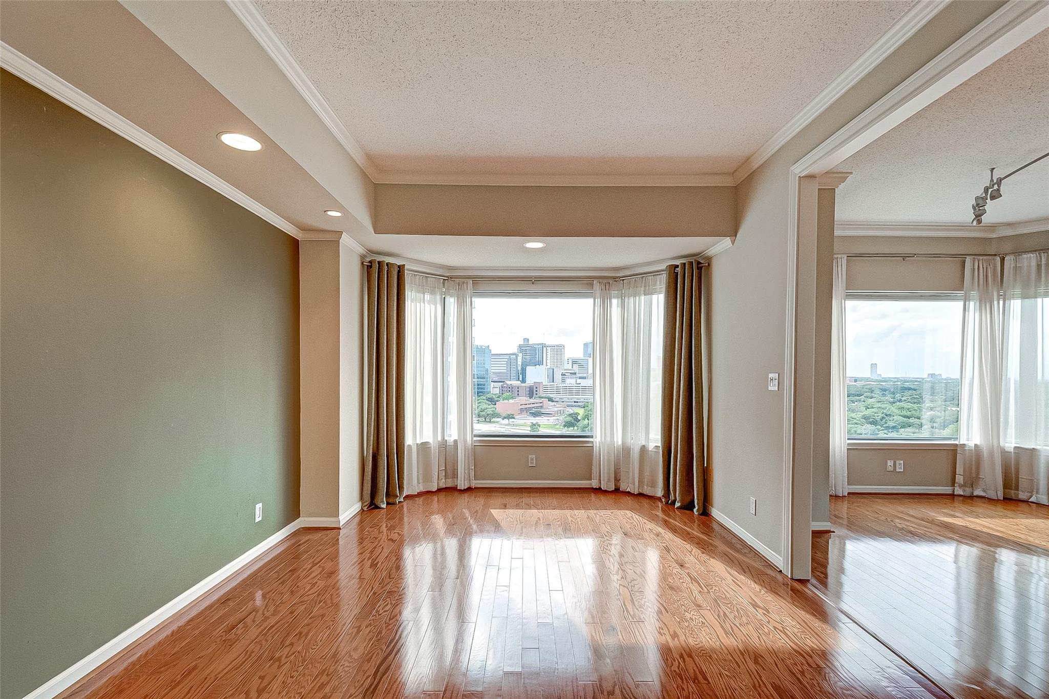Den - office area. It can be converted to a third bedroom. Gorgeous views throughout the whole house. - If you have additional questions regarding 2001 Holcombe Boulevard  in Houston or would like to tour the property with us call 800-660-1022 and reference MLS# 64818655.