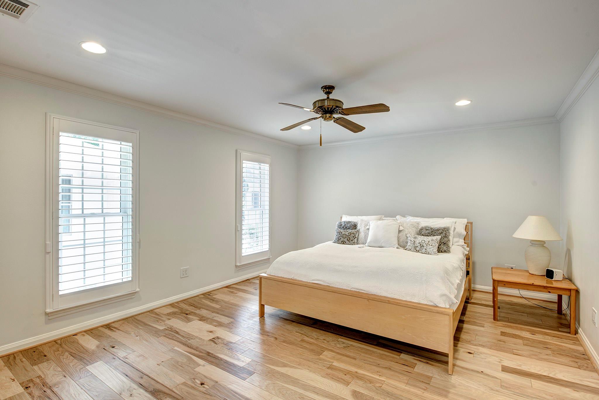 Spacious Master Suite with wood flooring overlooks the courtyard.&#xA; - If you have additional questions regarding 12326 Tunbridge Lane  in Houston or would like to tour the property with us call 800-660-1022 and reference MLS# 30688628.
