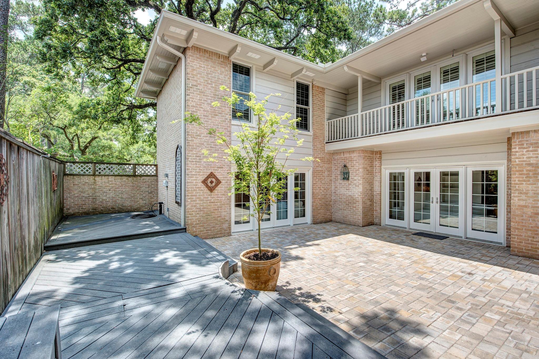 Courtyard with raised deck. New pavers installed 2019! Study, Entry Hall & Living Room all overlook the courtyard!&#xA; - If you have additional questions regarding 12326 Tunbridge Lane  in Houston or would like to tour the property with us call 800-660-1022 and reference MLS# 30688628.