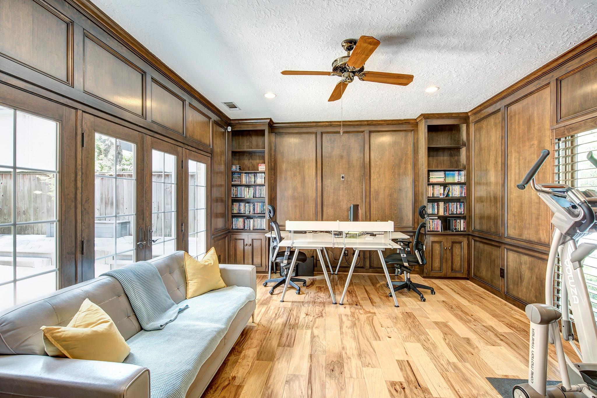 Block paneled study with wall of windows/double doors to courtyard and built-ins on both sides of the room. Doors to close off from entry. - If you have additional questions regarding 12326 Tunbridge Lane  in Houston or would like to tour the property with us call 800-660-1022 and reference MLS# 30688628.