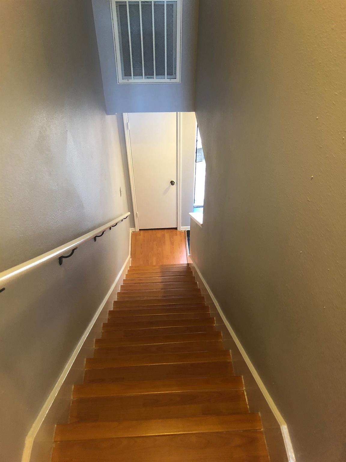 Stair case looking down. - If you have additional questions regarding 10924 Village Bend Lane  in Houston or would like to tour the property with us call 800-660-1022 and reference MLS# 71958240.