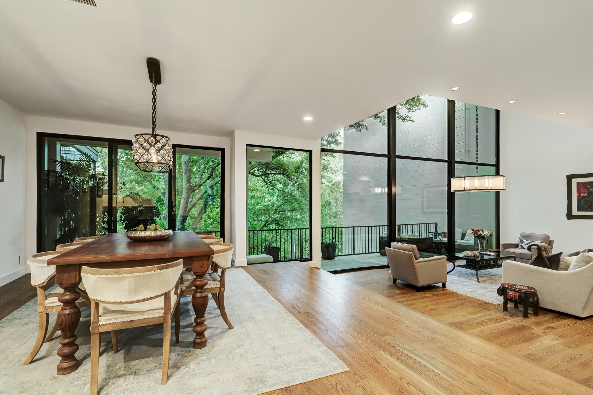 If you sit at the breakfast bar for a casual meal, you look right out the windows; the entire home has been designed around the views and natural light - If you have additional questions regarding 12 Farther Point  in Houston or would like to tour the property with us call 800-660-1022 and reference MLS# 18308540.