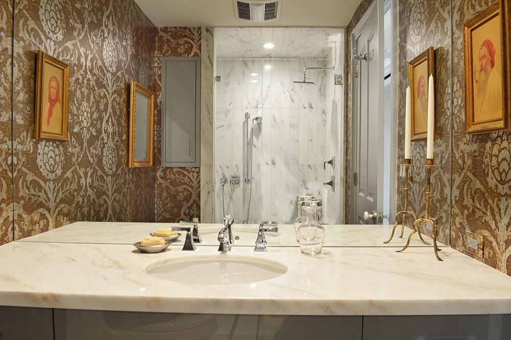 Second bathroom with marble shower. - If you have additional questions regarding 121 N Post Oak Lane  in Houston or would like to tour the property with us call 800-660-1022 and reference MLS# 37800884.