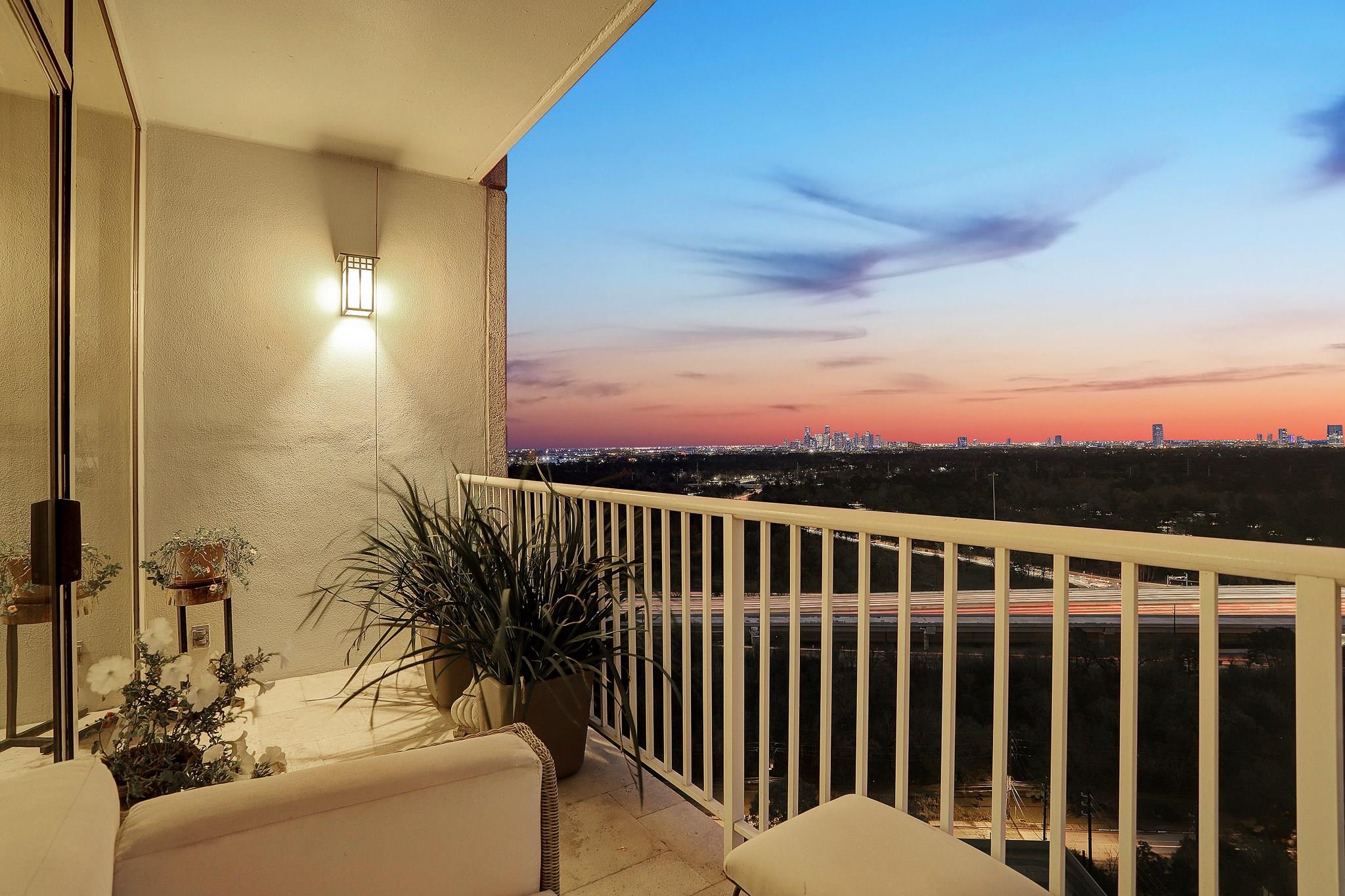 The owners enjoy watching the changing city views from the balcony located off their living room. - If you have additional questions regarding 121 N Post Oak Lane  in Houston or would like to tour the property with us call 800-660-1022 and reference MLS# 37800884.