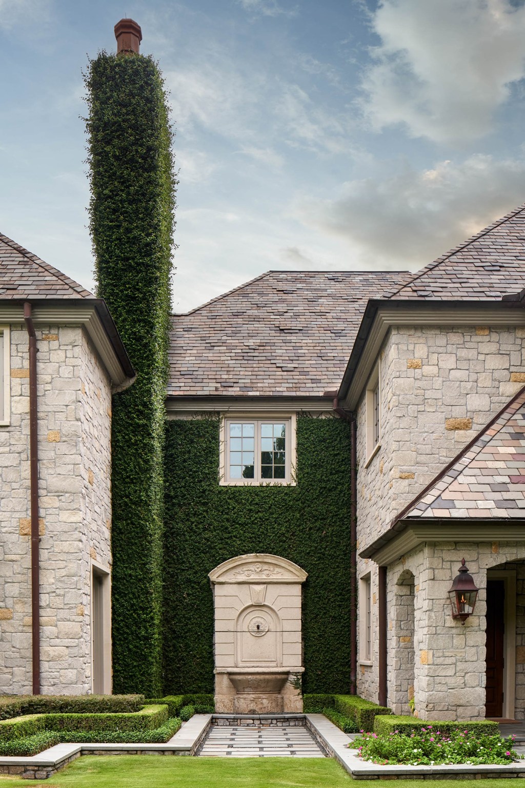 Ivy clad stoned walls accented by rare antique French fountains that cradle the main entrance way. - If you have additional questions regarding 120 Carnarvon Drive  in Houston or would like to tour the property with us call 800-660-1022 and reference MLS# 68693930.