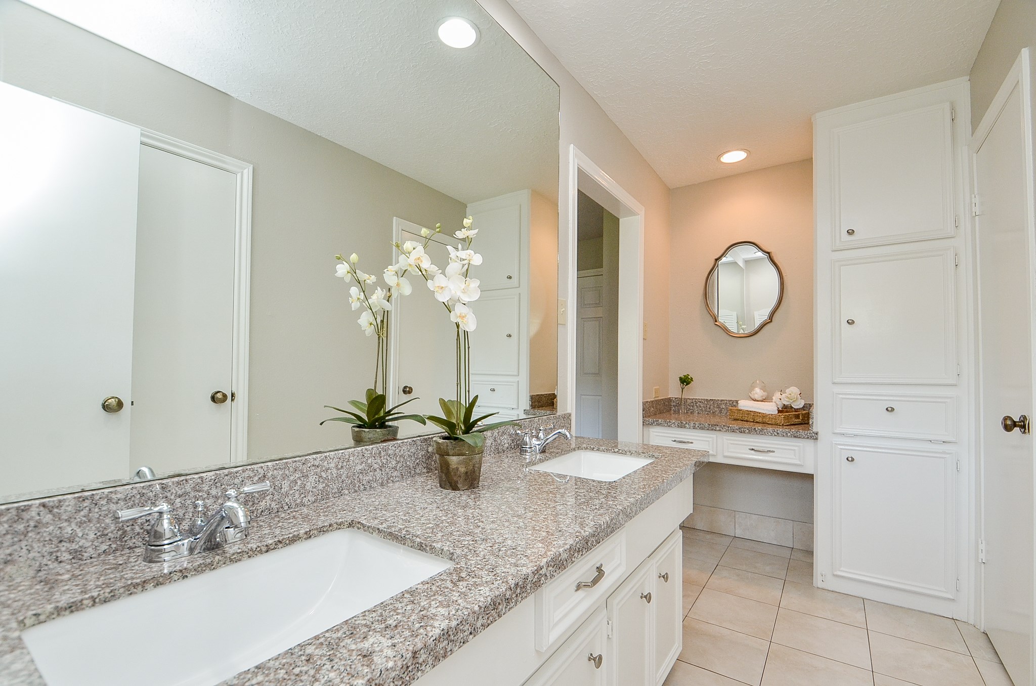 Primary Bathroom with vanity, separate vanity, double closets and lots of linen storage - If you have additional questions regarding 14003 Briar Place Drive  in Houston or would like to tour the property with us call 800-660-1022 and reference MLS# 52196644.