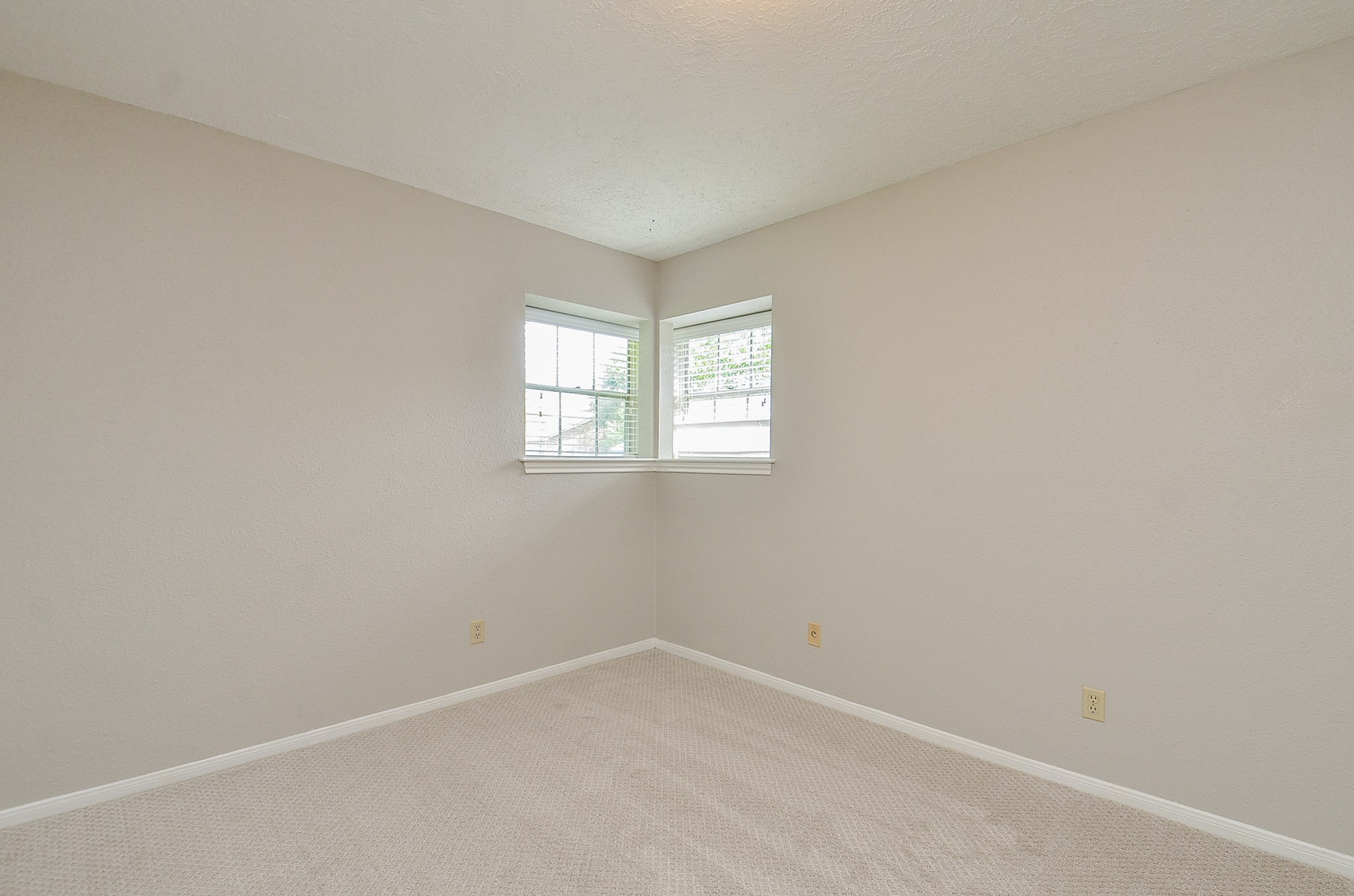 3rd bedroom with New Luxury Pattern carpet - If you have additional questions regarding 14003 Briar Place Drive  in Houston or would like to tour the property with us call 800-660-1022 and reference MLS# 52196644.