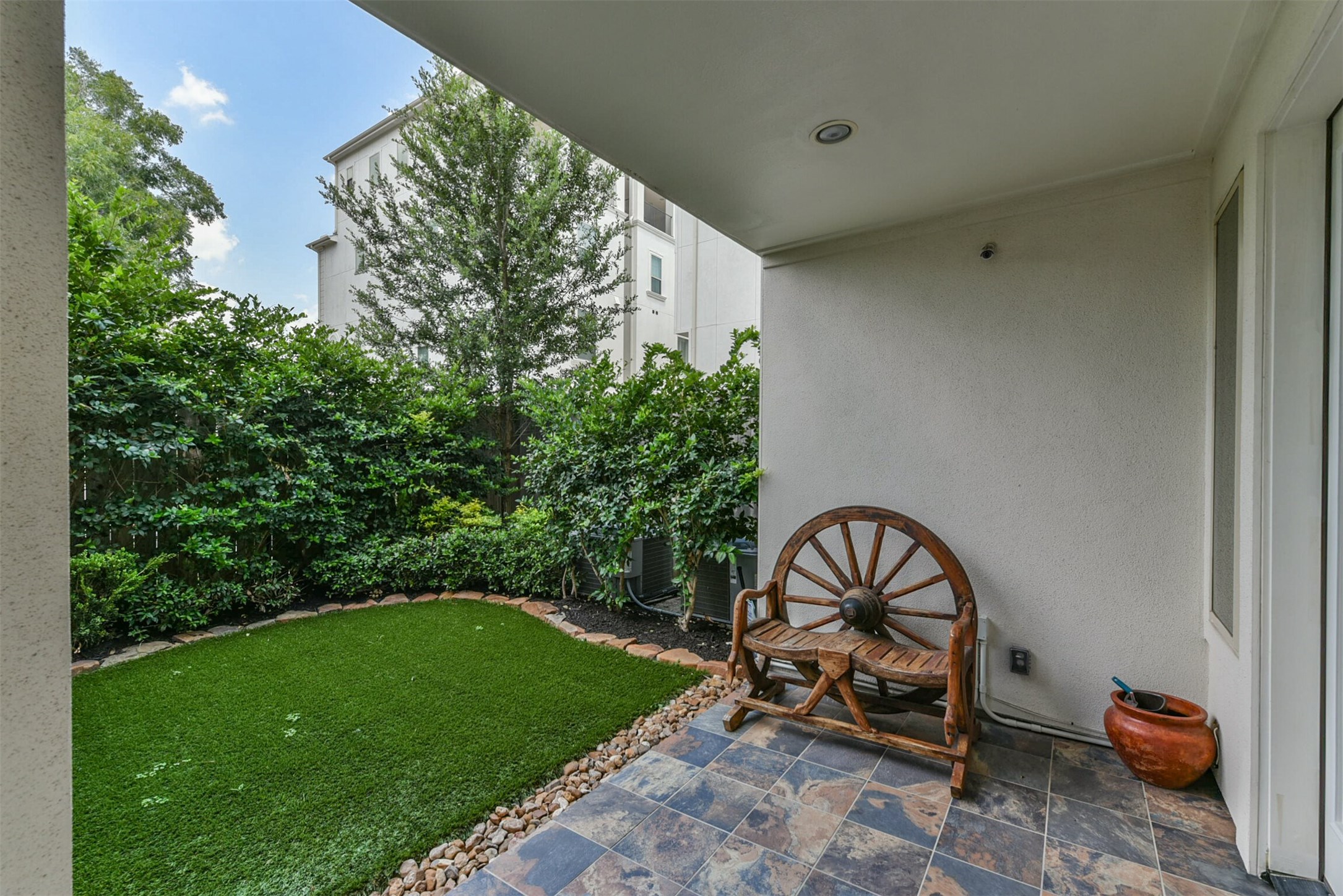 The covered patio shelters from the elements and links the study/bedroom to the backyard. - If you have additional questions regarding 4014 Barnes  in Houston or would like to tour the property with us call 800-660-1022 and reference MLS# 41866134.