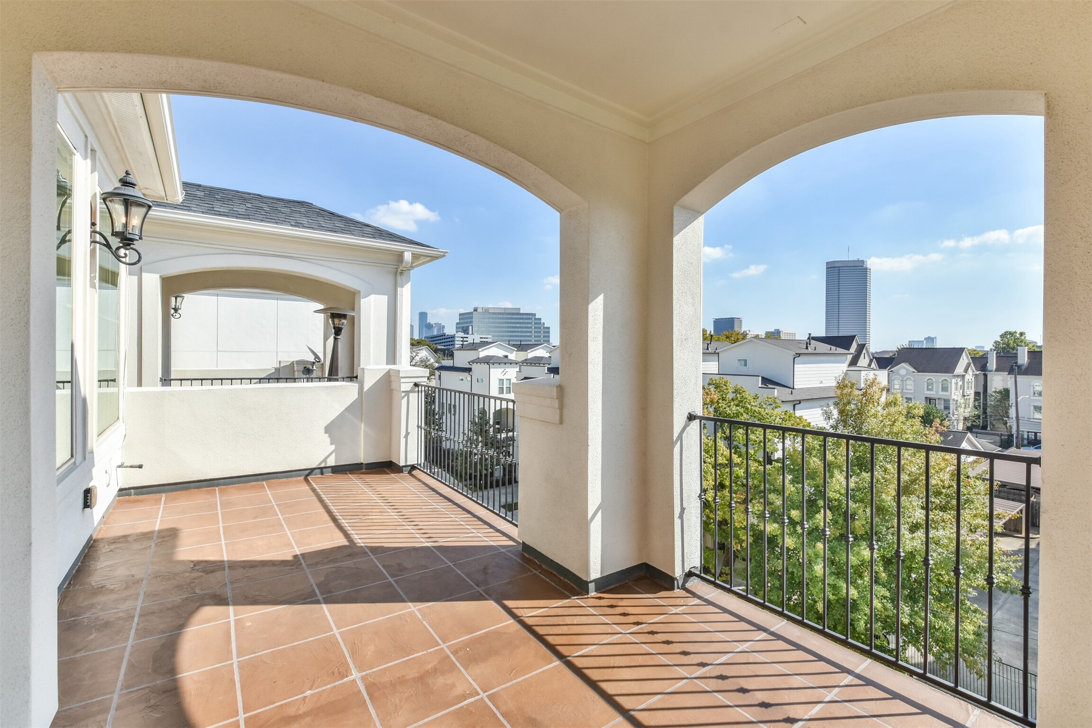 The large roof terrace with a fabulous view of downtown shelters from the elements but equally allows outdoor barbeque. - If you have additional questions regarding 4014 Barnes  in Houston or would like to tour the property with us call 800-660-1022 and reference MLS# 41866134.