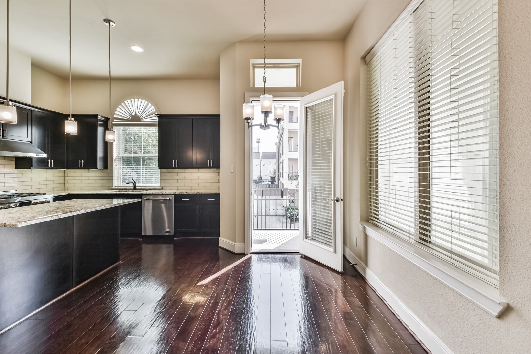 This additional space next to the kitchen with its  wall of windows and a door to the balcony invites you to use it as a cozy breakfast room. - If you have additional questions regarding 4014 Barnes  in Houston or would like to tour the property with us call 800-660-1022 and reference MLS# 41866134.