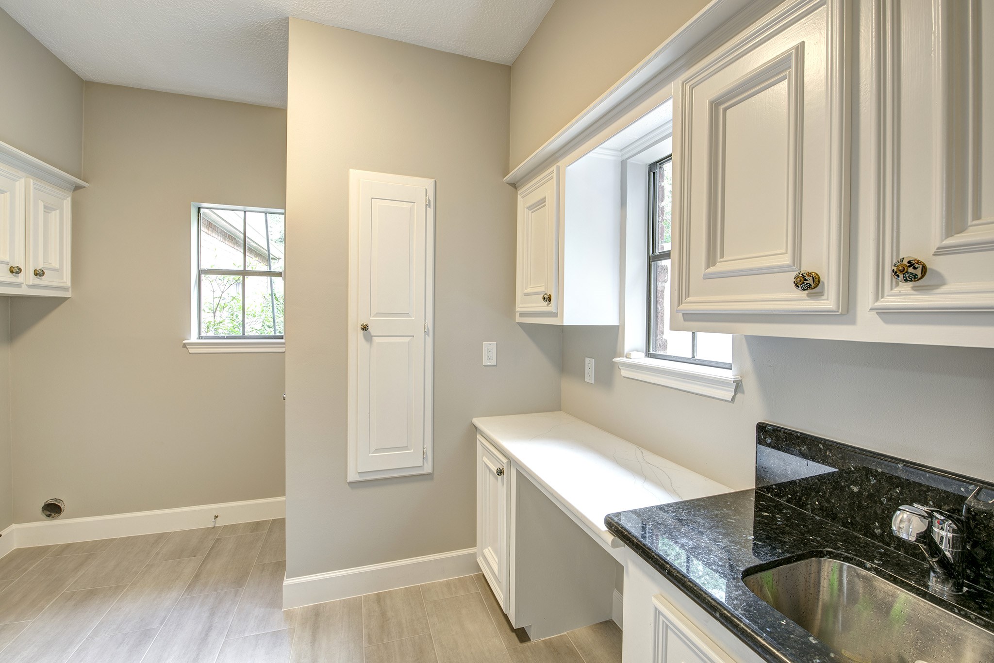 Utility room offers an abundance of space. - If you have additional questions regarding 815 Spear Point Cove  in Houston or would like to tour the property with us call 800-660-1022 and reference MLS# 57962108.
