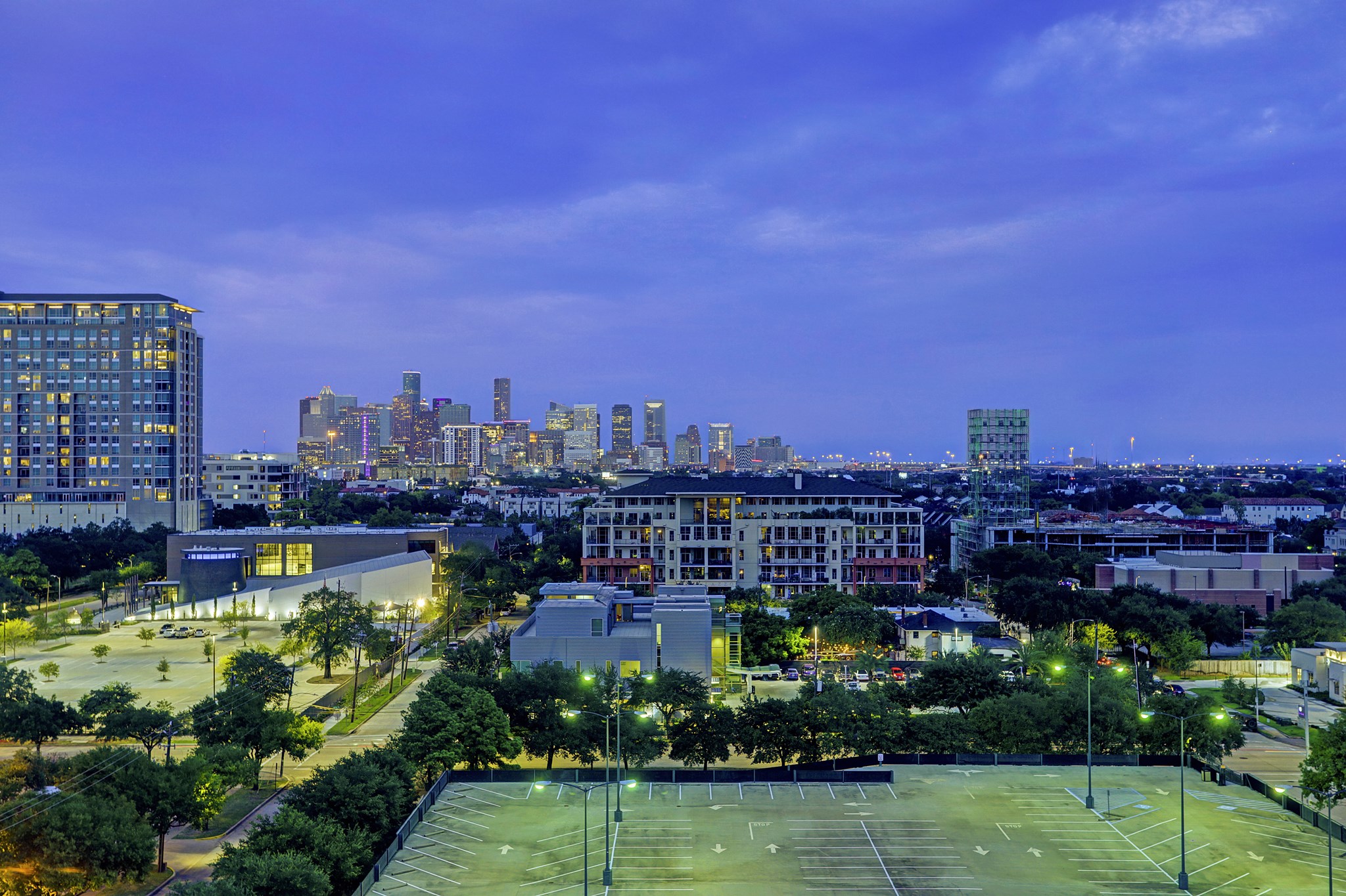 View directly at dusk out the windows overlooking downtown and beyond! - If you have additional questions regarding 1400 Hermann Drive  in Houston or would like to tour the property with us call 800-660-1022 and reference MLS# 12717209.