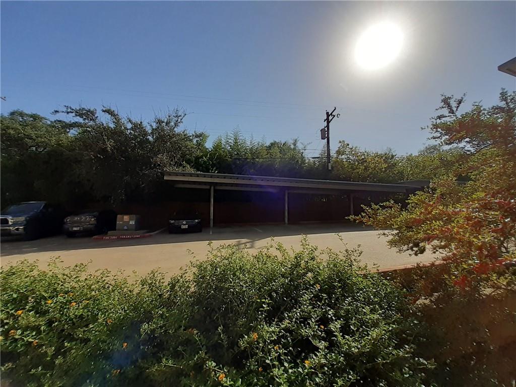 View of Carport Parking Spot from Patio - If you have additional questions regarding 2209 Hancock Drive  in Austin or would like to tour the property with us call 800-660-1022 and reference MLS# 5078136.