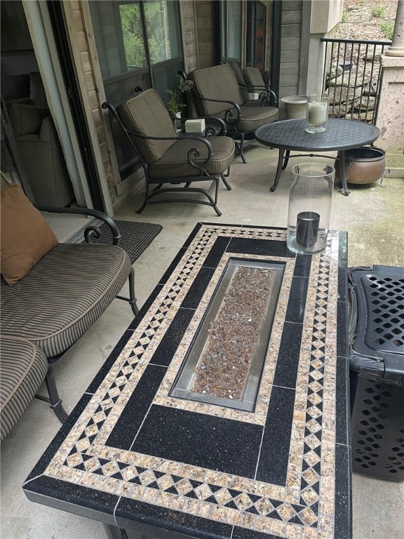 One of two good sized covered patios, this one off the main level living area - If you have additional questions regarding 1000 Liberty Park Drive  in Austin or would like to tour the property with us call 800-660-1022 and reference MLS# 2545624.