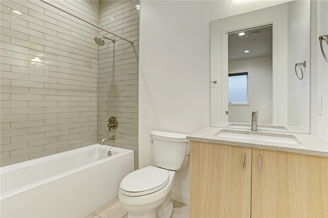 Guest bath - If you have additional questions regarding 1410 Woodlawn Boulevard  in Austin or would like to tour the property with us call 800-660-1022 and reference MLS# 4947735.