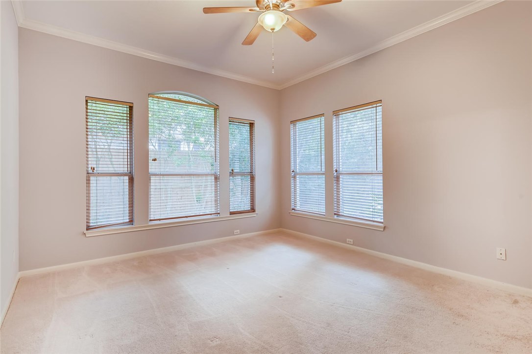 Master suite with wall of windows & fresh neutral paint colors. - If you have additional questions regarding 9009 Lantana Way  in Austin or would like to tour the property with us call 800-660-1022 and reference MLS# 6335387.
