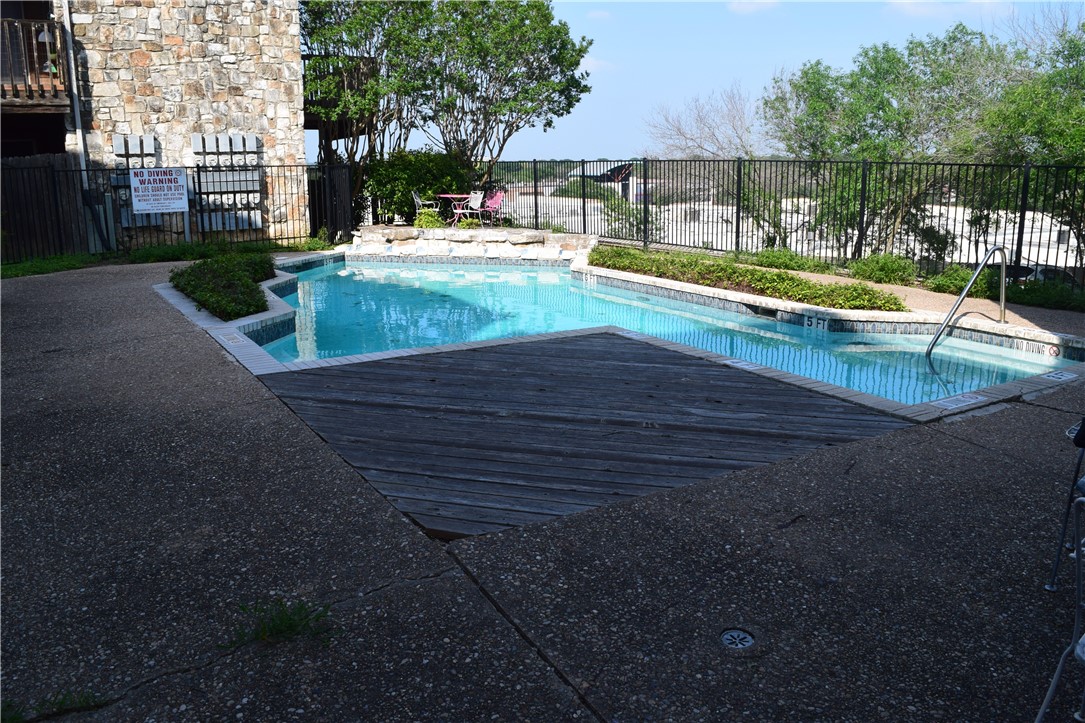 community pool with water feature. - If you have additional questions regarding 6903 Deatonhill Drive  in Austin or would like to tour the property with us call 800-660-1022 and reference MLS# 1822022.