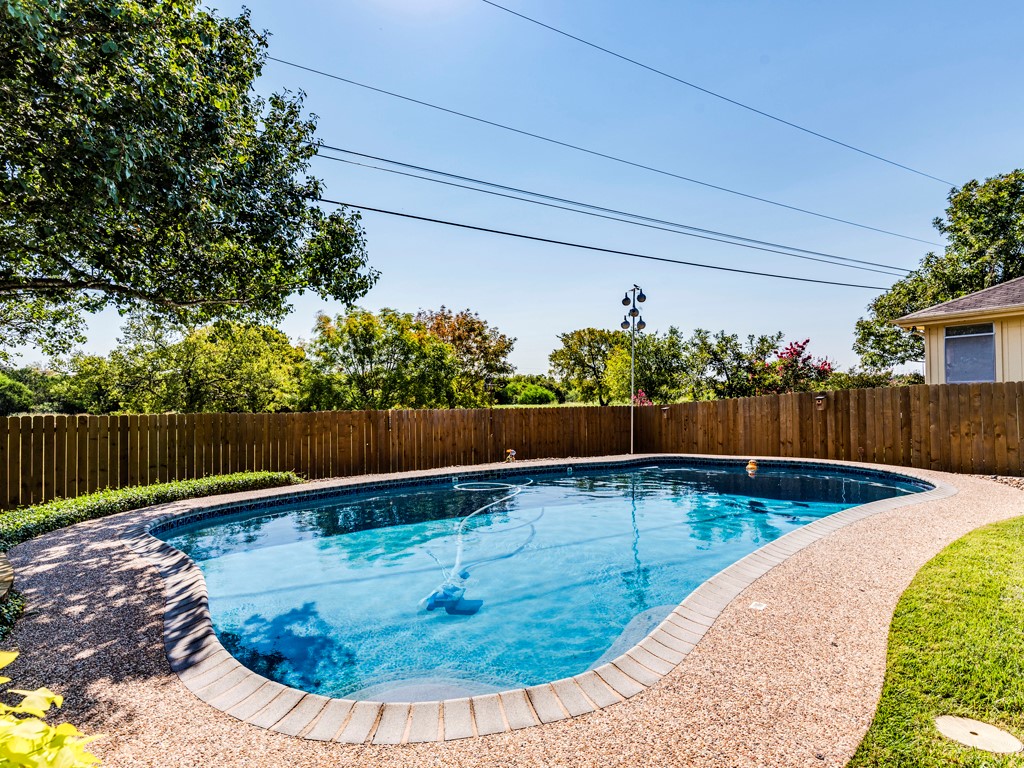 3-6.5 ft. deep, plaster lined pool with tile and cement decking. - If you have additional questions regarding 7511 Ponoma Trail  in Austin or would like to tour the property with us call 800-660-1022 and reference MLS# 8845262.