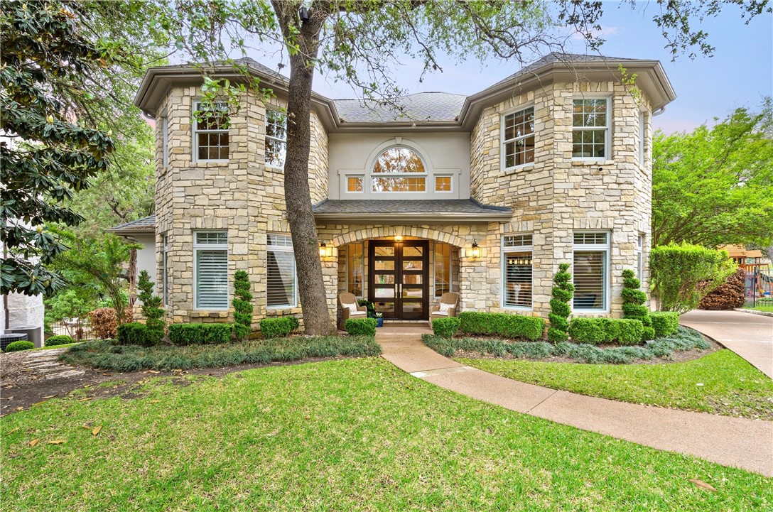 The stone exterior is shaded by mature trees, and a winding path to the front door beckons you inside. - If you have additional questions regarding 2904 MEANDERING RIVER Court  in Austin or would like to tour the property with us call 800-660-1022 and reference MLS# 1563524.
