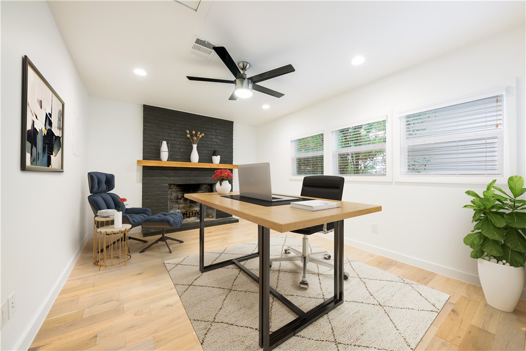 Virtually staged study with fireplace near kitchen and living/dining.  A portable closet could add another bedroom. - If you have additional questions regarding 1408 Summit Street  in Austin or would like to tour the property with us call 800-660-1022 and reference MLS# 6576935.