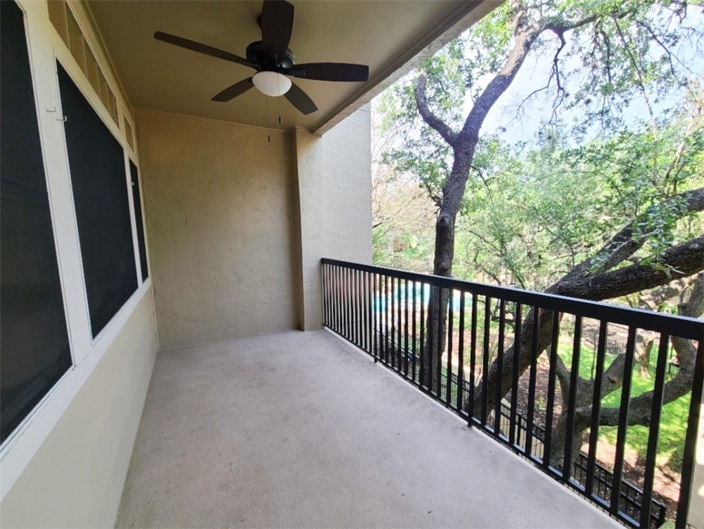 Large Patio with Plenty of Sitting Room and Fan and Serene View - If you have additional questions regarding 9525 N Capital Of Texas Highway  in Austin or would like to tour the property with us call 800-660-1022 and reference MLS# 9248672.